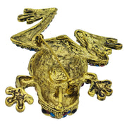 Broche rana colgante de metal dorado y brillantes de strass multicolor. Trasera en color oro viejo con alfiler y seguro.
Puede usarse también como colgante con una cadena ya que lleva una argolla en la parte superior. Mide 8 cm de largo x 5 cm de ancho.