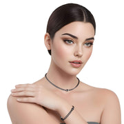 Set de pulsera y collar  de cuero sintético trenzado gris y rondelles de strass