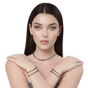 Set de pulsera y collar  de cuero sintético trenzado gris y rondelles de strass