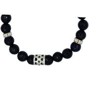 Escondenudos de plata calada de pulsera de ónix facetado