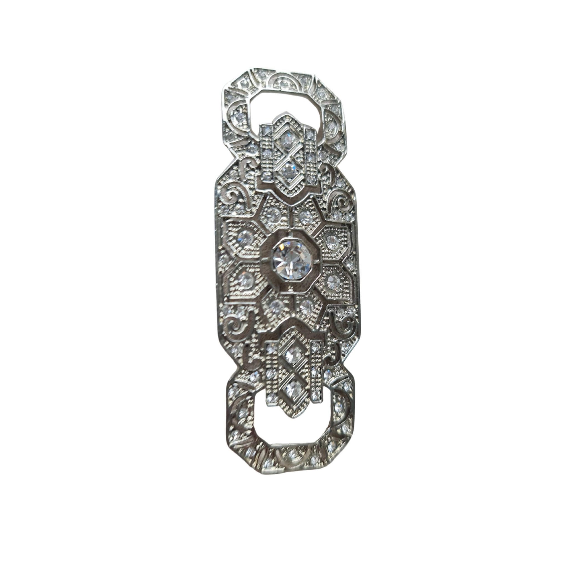 Broche alargado rectangular plateado con brillantes blancos 