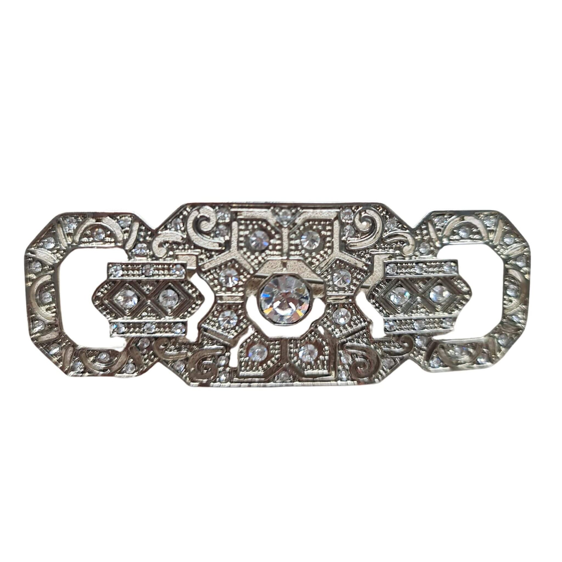 Broche alargado rectangular plateado con brillantes blancos 