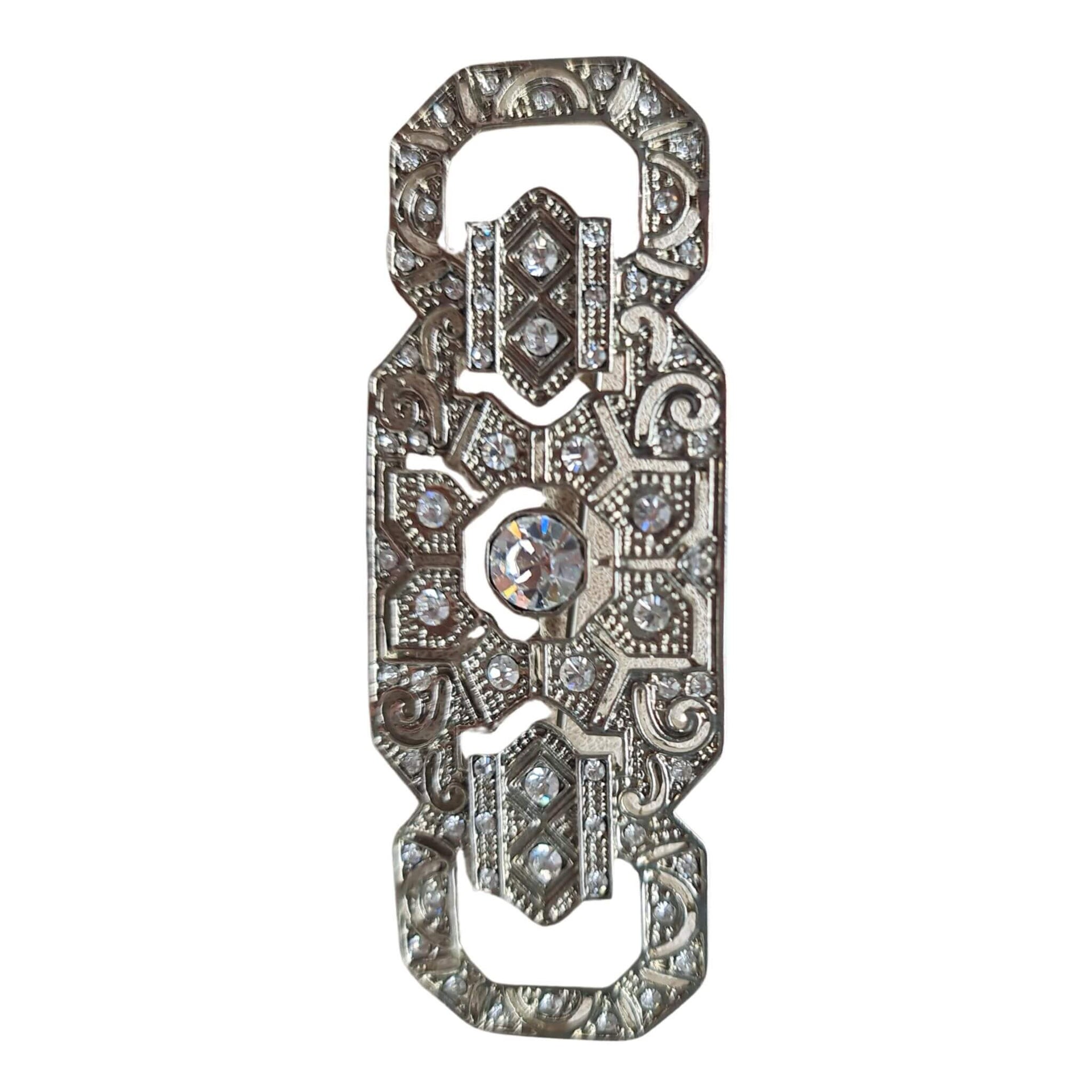 Broche alargado rectangular plateado con brillantes blancos 