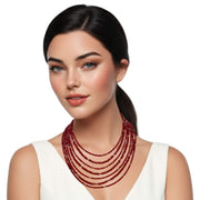 Collar cristal rojo facetado de 6 y 4mm de 7 vueltas. Precioso cierre de plata de ley labrado. Mide 42 cm en su tira más corta. . El broche decorativo es de quita y pon.