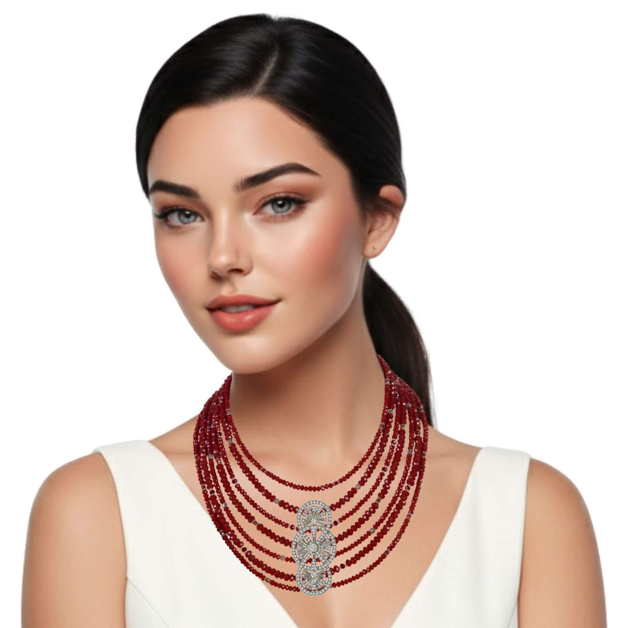 Collar cristal rojo facetado de 6 y 4mm de 7 vueltas. Precioso cierre de plata de ley labrado. Mide 42 cm en su tira más corta. . El broche decorativo es de quita y pon.