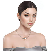 Collar de hematite plata y pieza y huevo oval central de plata de ley