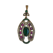 Colgante herradura oval de plata dorada con esmeraldas y rubíes naturales