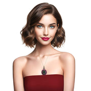 Colgante de plata de ley ovalado con piedras semipreciosas de esmeraldas y rubíes