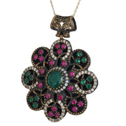 Colgante de plata de ley con piedras semipreciosas de esmeraldas y rubíes