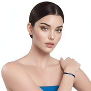 Pulsera de cuero negro y central de brillantes de cristal azul