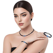 Set de pulsera y collar de cuero negro y brillantes de cristal azul