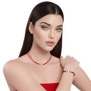 Set de pulsera y collar de cuero rojo y brillantes de cristal blancos