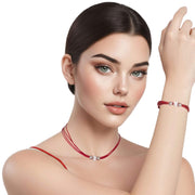 Set de pulsera y collar de cuero rojo y brillantes de cristal blancos