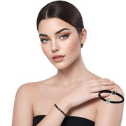 Pulsera de cuero sintético trenzado negro y rondelles de strass