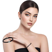 Pulsera de cuero sintético trenzado negro y rondelles de strass
