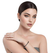 Pulsera de cuero sintético trenzado gris y rondelles de strass