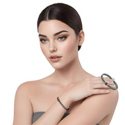 Pulsera de cuero sintético trenzado gris y rondelles de strass