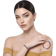 Pulsera de cuero chocolate y central de brillantes de cristal azul