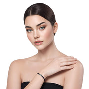 Pulsera de cuero negro y brillantes de cristal blancos