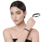 Pulsera de cuero negro y tubo de strass negro