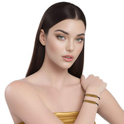 Pulsera de cuero marrón y tubo central de strass dorado