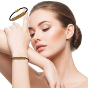 Pulsera de cuero marrón y tubo central de strass dorado