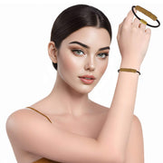 Pulsera de cuero marrón y tubo central de strass dorado