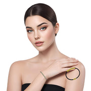 Pulsera de cuero negro con pieza dorada de brillantes de strass