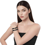 Pulsera de ónix facetado y central de brillantes de puntitos