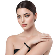 Pulsera de ónix facetado y central de brillantes de puntitos
