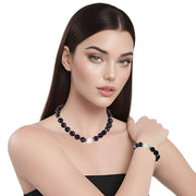 Set de pulsera y collar de onix facetado negro y bola jade central en blanco