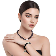 Set de pulsera y collar de onix facetado negro y bola jade central en blanco