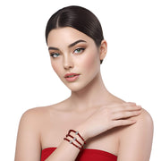 Pulsera de cristal rojo y central de brillantes de cristal en blanco